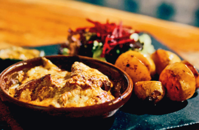 Filets de caille rôtis à l'huile de truffes blanches et gratinés au comté
