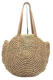 Sac rond à porter à l’épaule,
en matière tressée naturelle,
la pièce tendance à avoir -
Comme des Filles